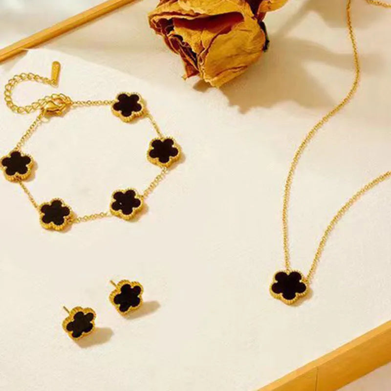 Steel plum blossom plant Necklace/Earrings/Bracelet